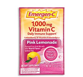 Box of Emergen-C Everyday Immune Support in Pink Lemonade flavor with packet and water glass