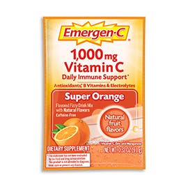 Box of Emergen-C Everyday Immune Support in Super Orange flavor with packet and water glass