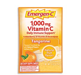 Box of Emergen-C Everyday Immune Support in Tangerine flavor with packet and water glass Box of Emergen-C Everyday Immune Support in Tangerine flavor with packet and water glass