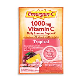 Box of Emergen-C Everyday Immune Support in Tropical flavor with packet and water glass Box of Emergen-C Everyday Immune Support in Tropical flavor with packet and water glass