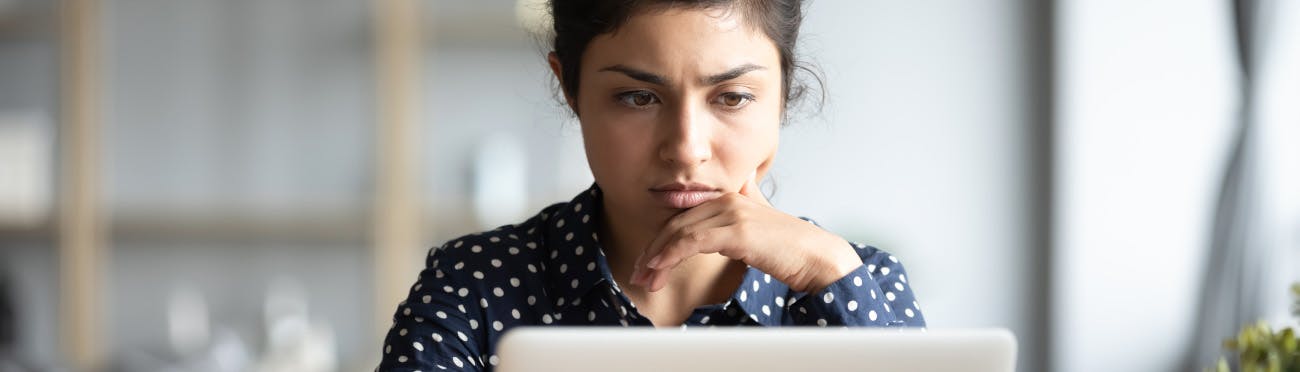 woman looking at computer