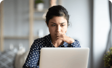 woman looking at computer