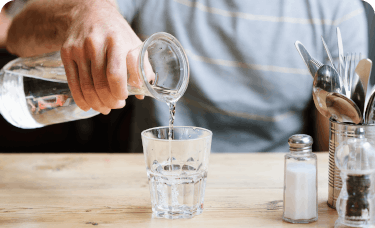 Water being poured into a glass