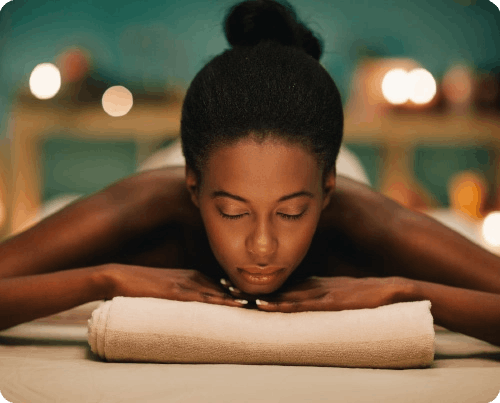 Woman getting a massage to relieve headache pain