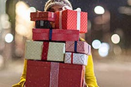 person carrying gifts