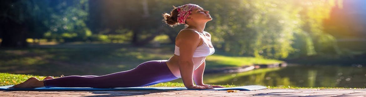 Women doing yoga to relieve stress