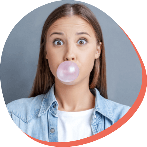 young woman blowing a bubble with bubble gum