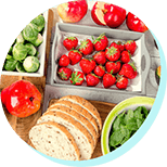 image of strawberries, fresh cut bread, brussel sprouts, apples, and spinach