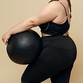 Person holding exercise ball
