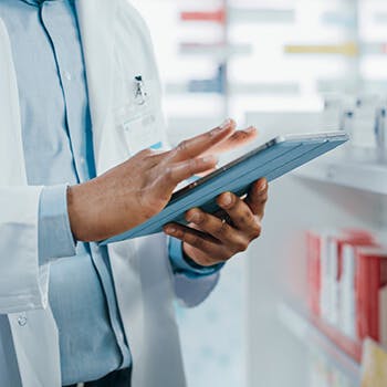 Pharmacist on tablet Pharmacist on tablet
