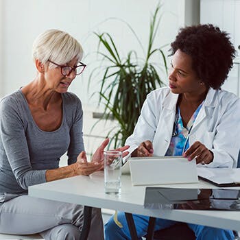 Doctor talking to patient