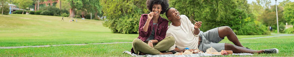 Teen Coulpe sitting on park