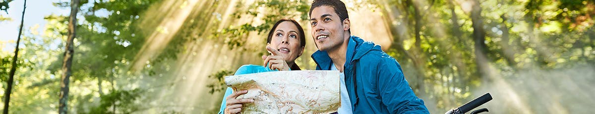 man and women searching the address using sitemap