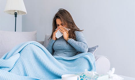 Woman sick with a cold