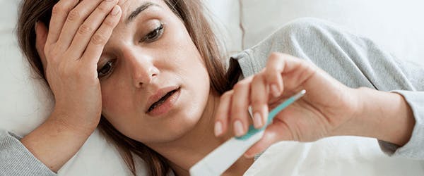 Woman with fever Woman with fever