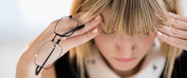 Woman with headache Woman with headache