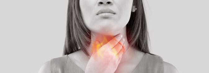 Woman experiencing acid reflux or GERD