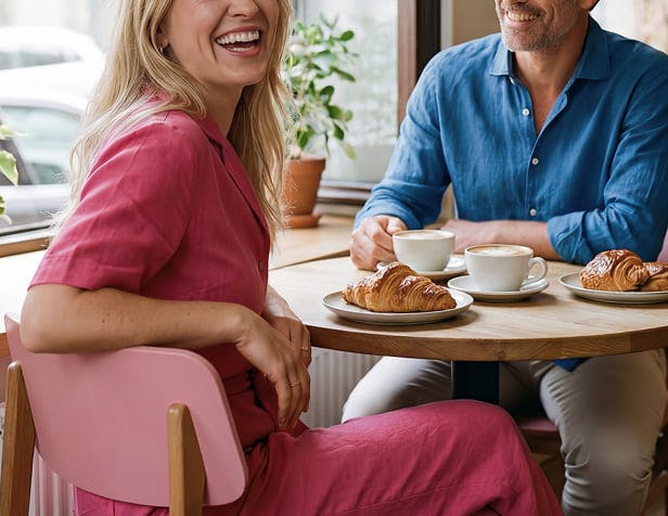 man and woman in café