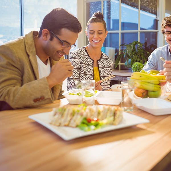 Group of friends enjoying lunch together.