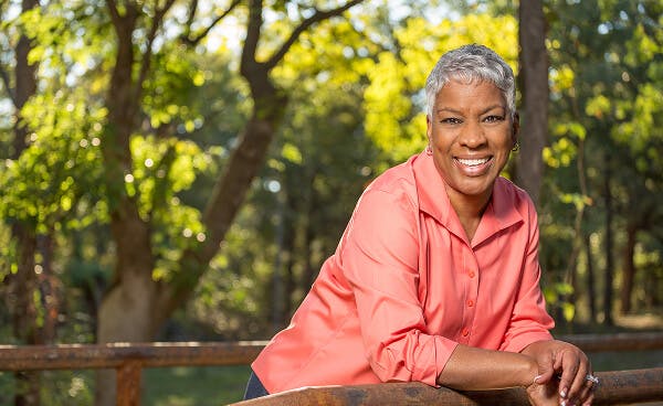 Smiling woman in her 50s