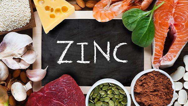 Salmon, cheese, spinach, mushrooms, almonds, and other foods high in zinc