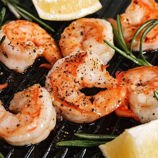 grilled shrimp with seasonings and herbs