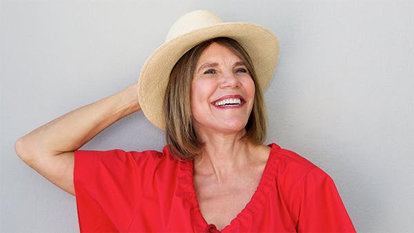 Healthy middle-aged woman laughing