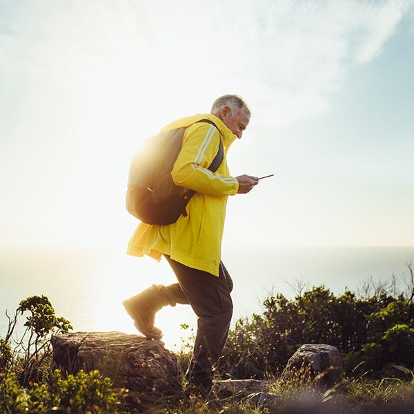 Person with a backpack hiking outside 