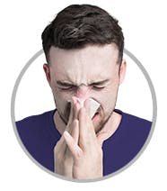 Nasal Congestion | Man blowing his nose Nasal Congestion | Man blowing his nose