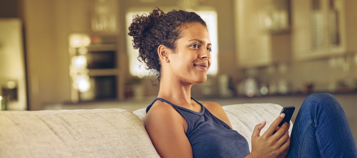 A women sitting on a sofa