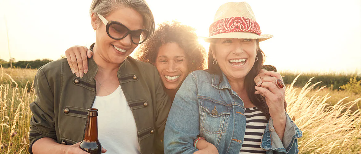 Three women laughing