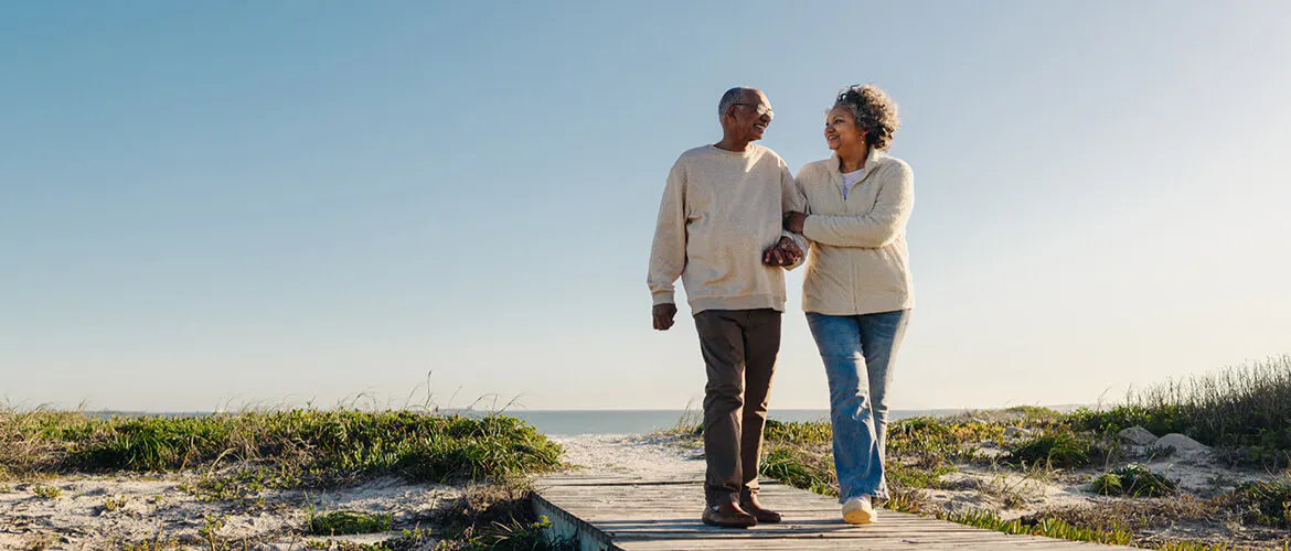 Couple walking on the beach
