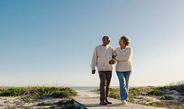 Couple walking on the beach