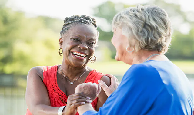 Women talking and laughing