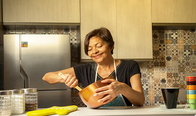 Woman cooking in a kitchen