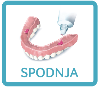 putting adhesive cream on lower dentures