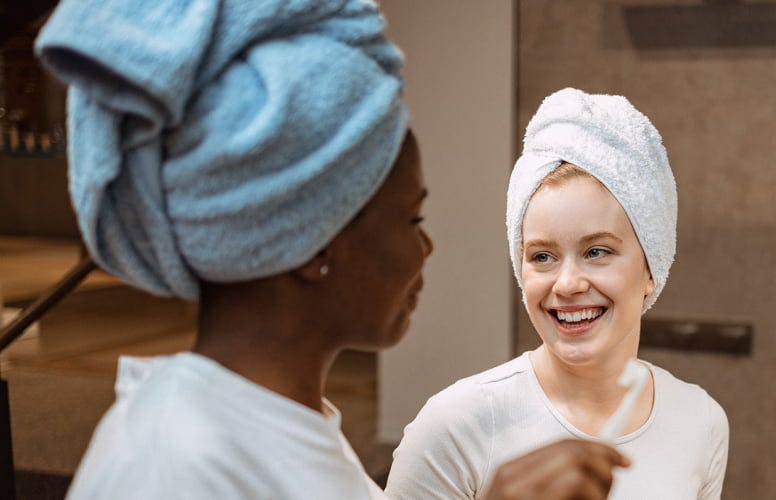 2 women smiling