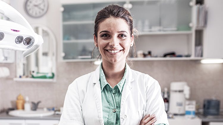 A smiling female dental professional 