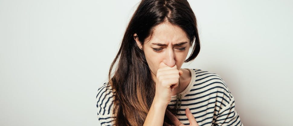 Woman coughing