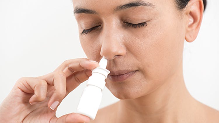 woman-nasal-spray