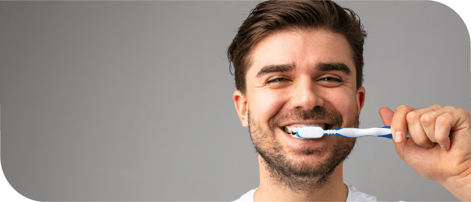 Arab male brushing teeth