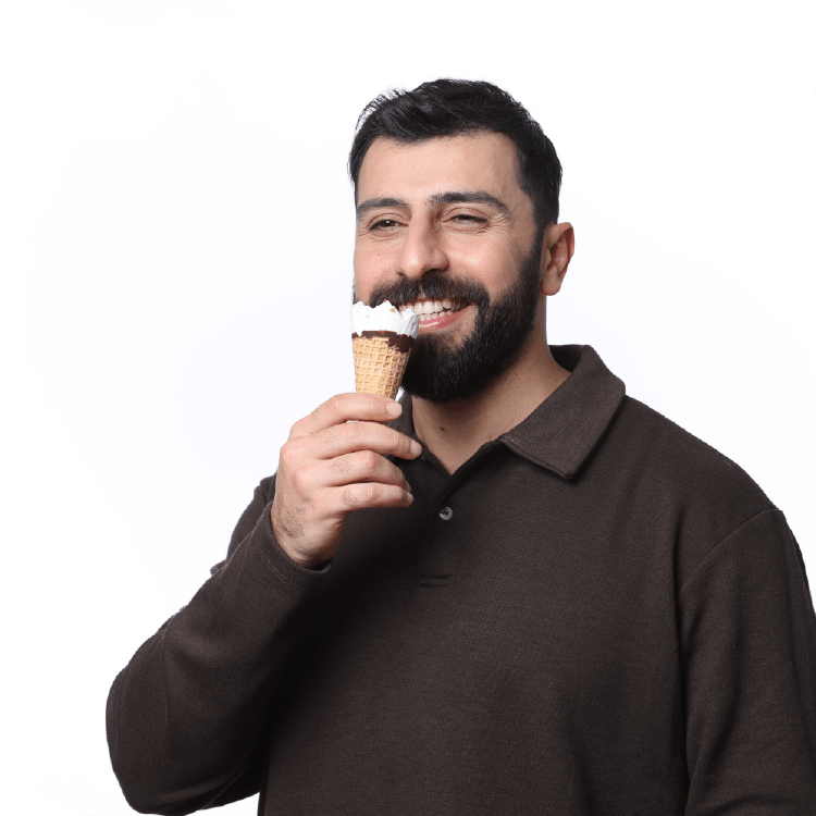 Happy male patient eating ice cream