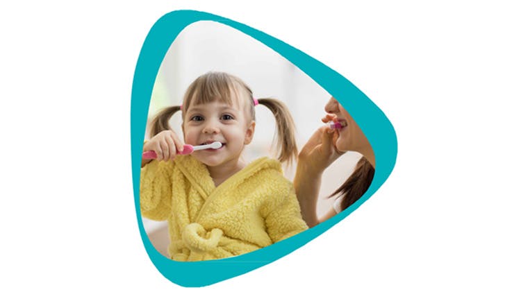 Child brushing teeth