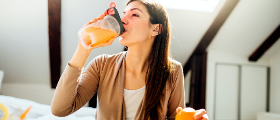 Woman drinking juice