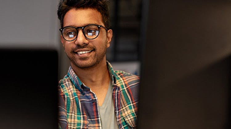 Person infront of computer doing Registration