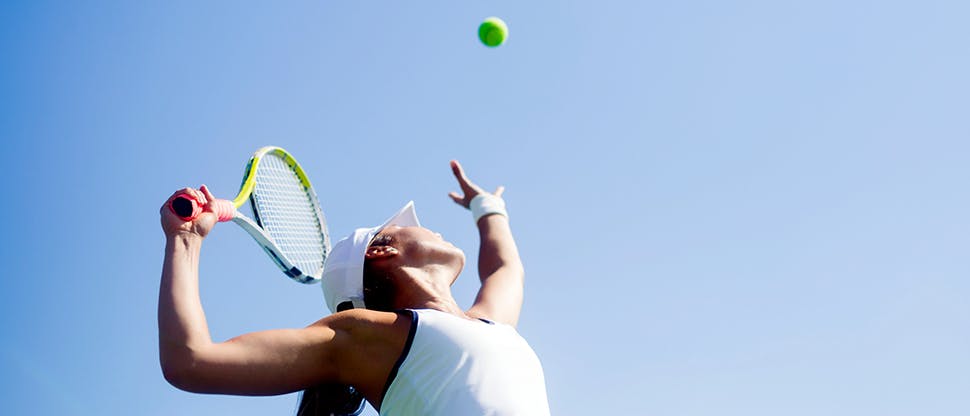 Woman playing tennis