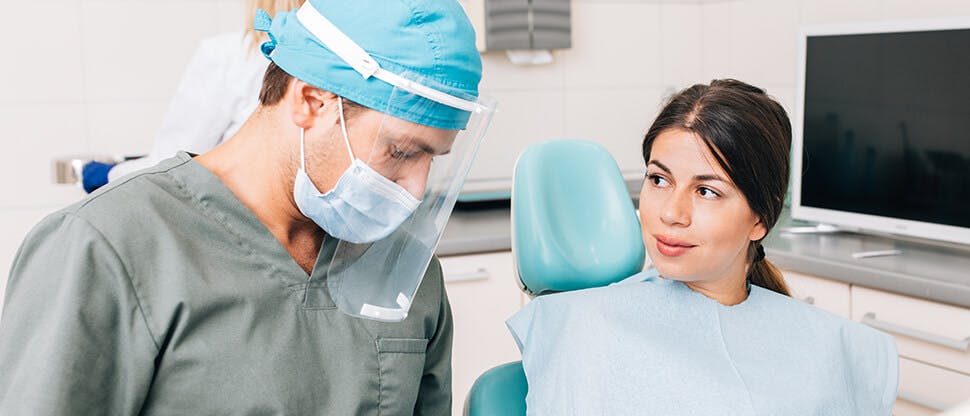 Dentist with patient