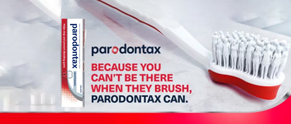 Close-up image of a toothbrush and a tube of parodontax whitening toothpaste, along with the text “parodontax – because you can’t be there when they brush, parodontax can.”