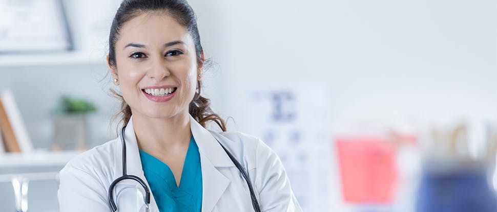 Female clinician smiling