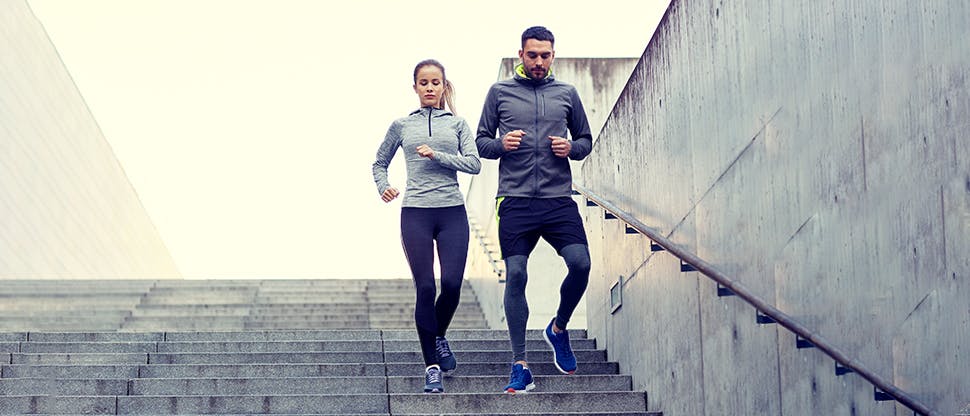 Man and woman exercising outdoors